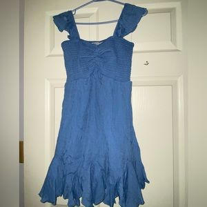 Stilletto’s Flutter Sleeve Sweetheart Smocked Godet Mini Dress